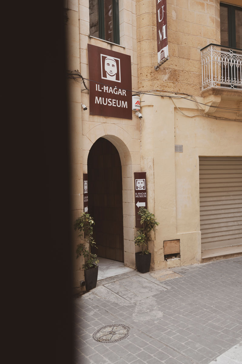 The entrance to Il-Ħaġar Museum in Victoria, Gozo, showcasing its cultural exhibitions and historical significance near St. George’s Square.